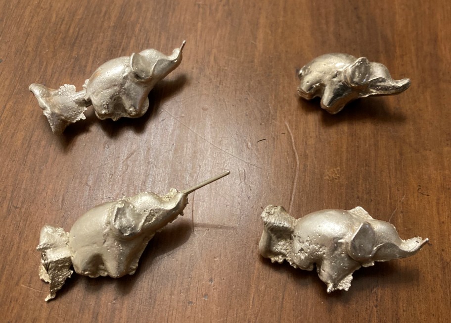 Cracking Retirement - image of small cast silver elephants
